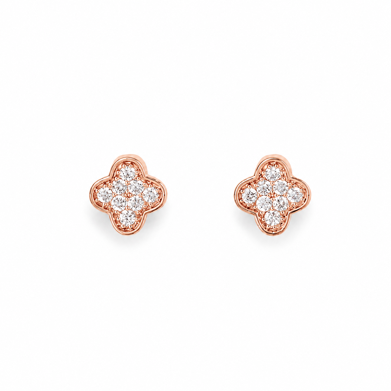 A pair of rose gold stud earrings with a four-petal clover or flower motif, each adorned with a pavé setting of clear round-cut stones, shown on a plain white background.