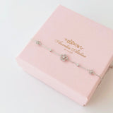 Secret Blossom Bracelet in silver / ROSE GOLD with crystal daisy flower charms