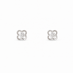 A pair of silver-toned four-leaf clover stud earrings with clear round-cut center stones, set against a plain white background.